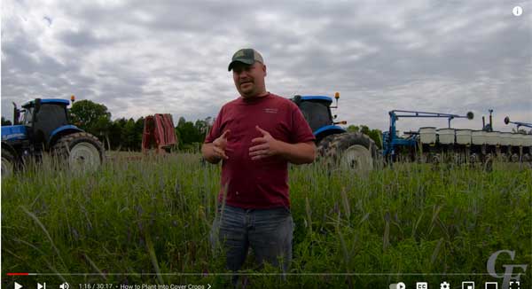 Man standing in farm field