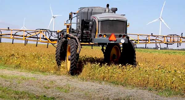 High clearance planter in farm field