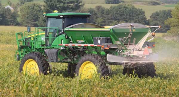 Planter interseeding crop seed