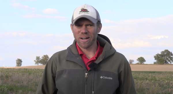 Farmer talking to camera