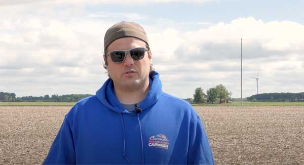 Farmer talking in farm field