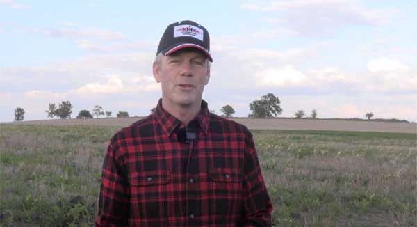 Farmer talking to camera