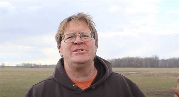 Farmer talking to the camera