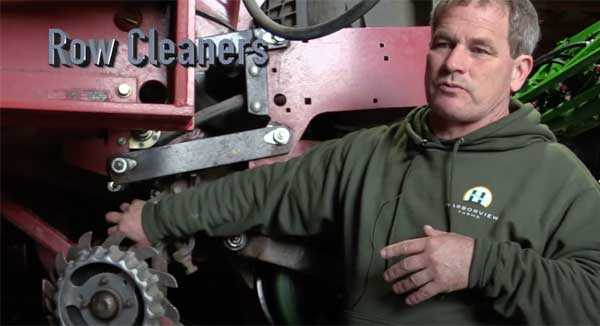 Man standing in front of row cleaners