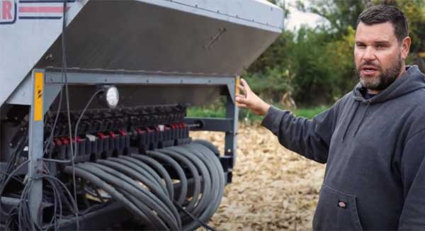 Man showing planter equipment