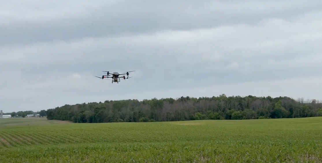 Drone flying over a farm field